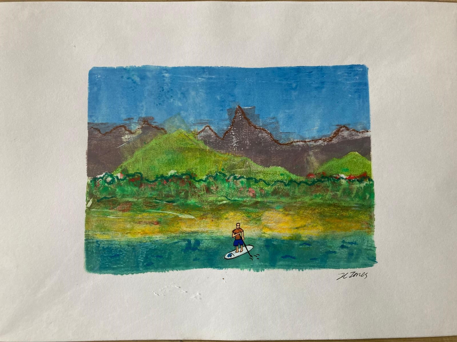 Paddle boarder in the sea